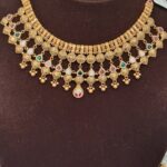 916 Yellow Gold Dokiyu With Green, White and Red Stones